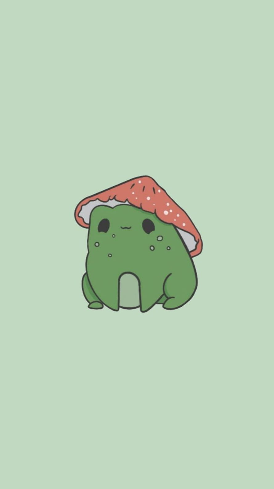 Cute cartoon frog wearing a red mushroom cap on a soft mint green background HD phone wallpaper
