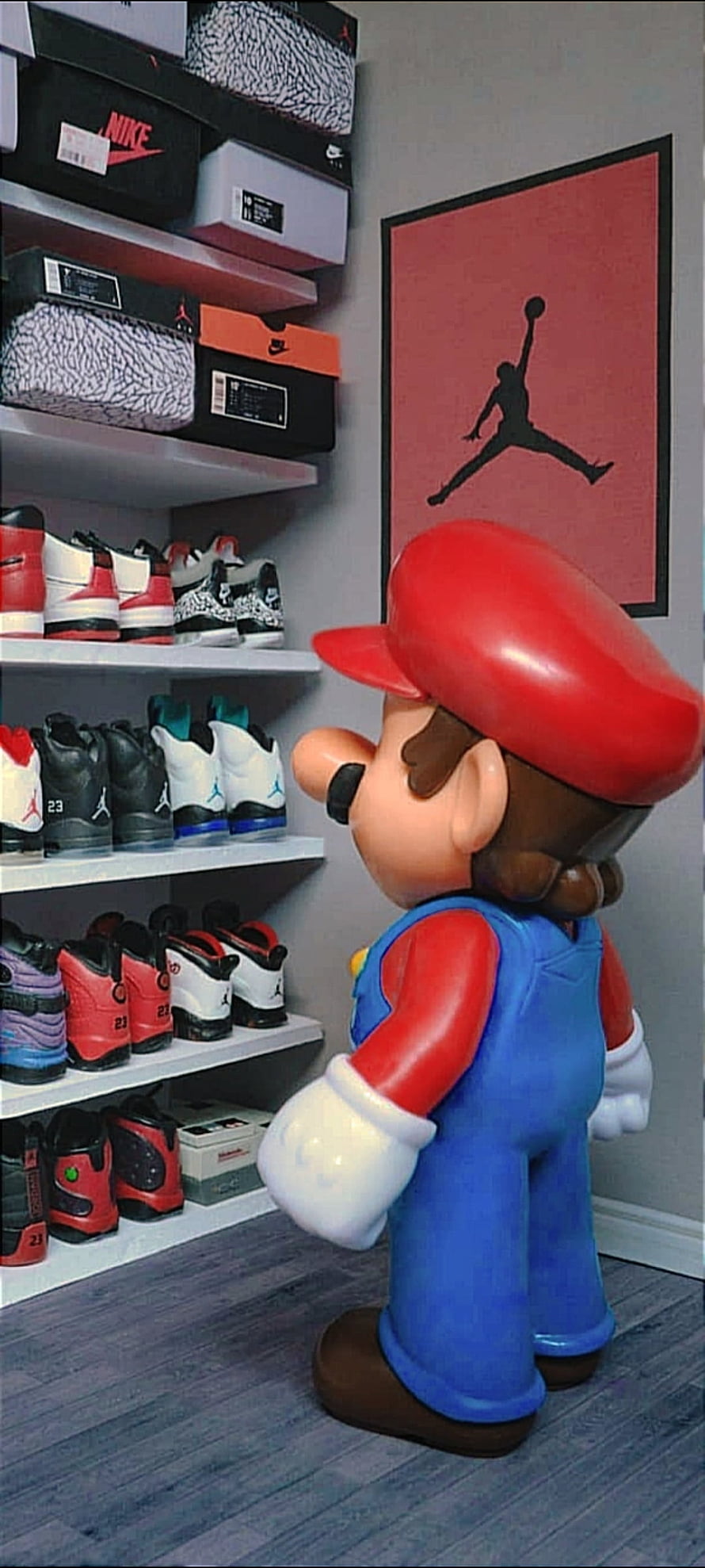 Mario Statue Admiring Jordan Sneaker Collection in Shoe Room HD phone wallpaper