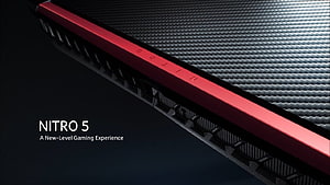 Acer Nitro 5 Gaming Laptop Carbon Fiber Texture and Red Accent Detail HD wallpaper