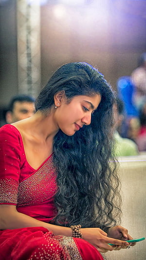 Woman in Red Saree Looking at Phone, South Heroine, Sai Pallavi, Gorgeous Actress HD phone wallpaper