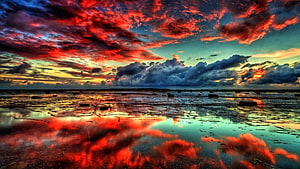 Dramatic Red and Blue Sunset Sky Reflected in Shallow Water Pools HD wallpaper