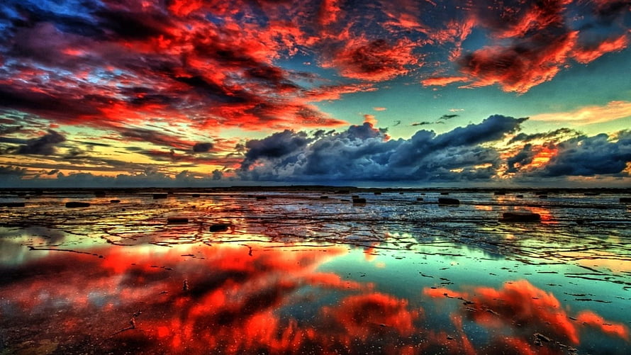 Dramatic Red and Blue Sunset Sky Reflected in Shallow Water Pools HD wallpaper
