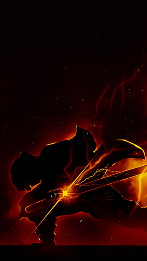 Silhouette of a warrior wielding a glowing sword with fiery energy effects HD phone wallpaper