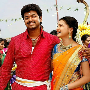 Vijay and Samantha in traditional attire smiling together at a festive cultural event, Anna Thangachi Love. Sisters , Sisters movie, Love couple , Velayutham HD phone wallpaper