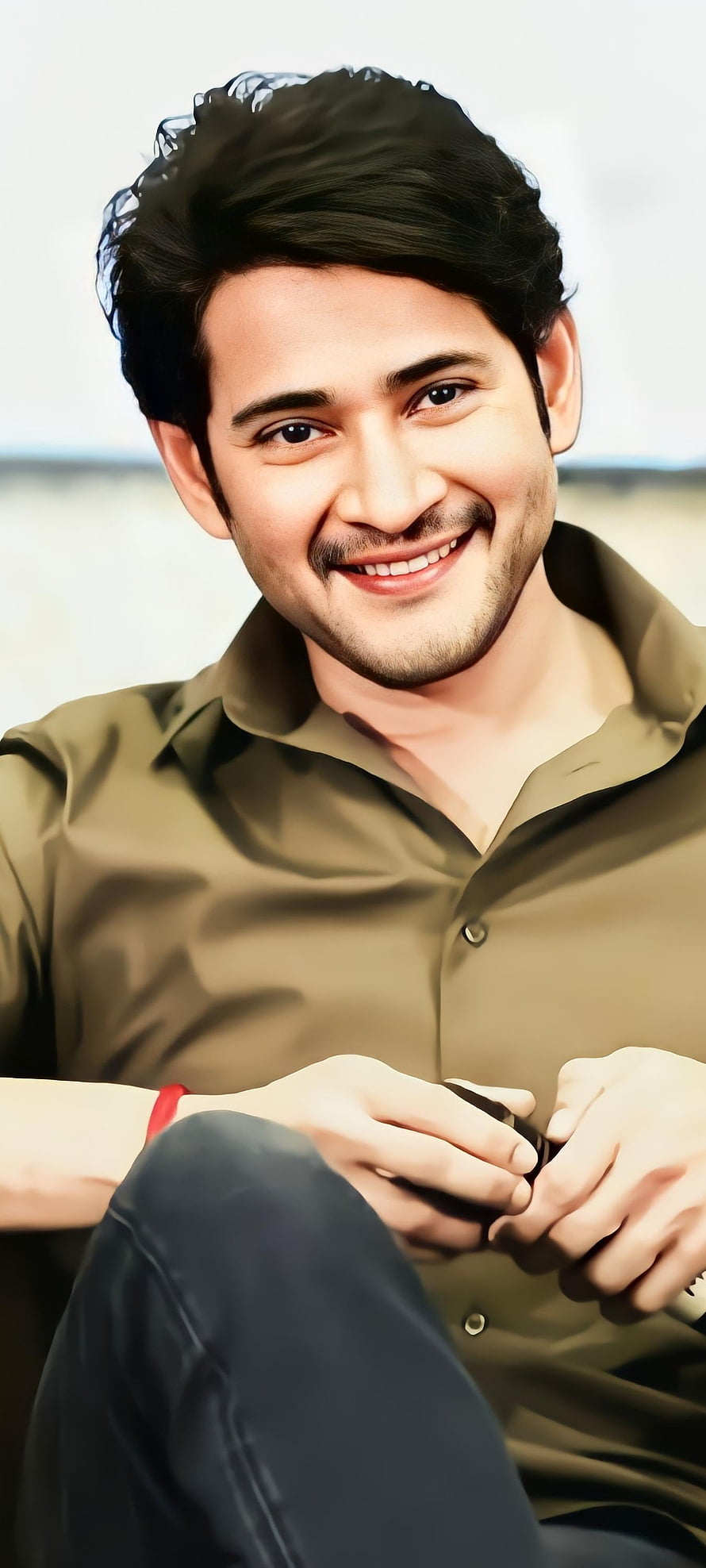 Mahesh Babu smiling portrait in olive shirt with soft outdoor background HD phone wallpaper