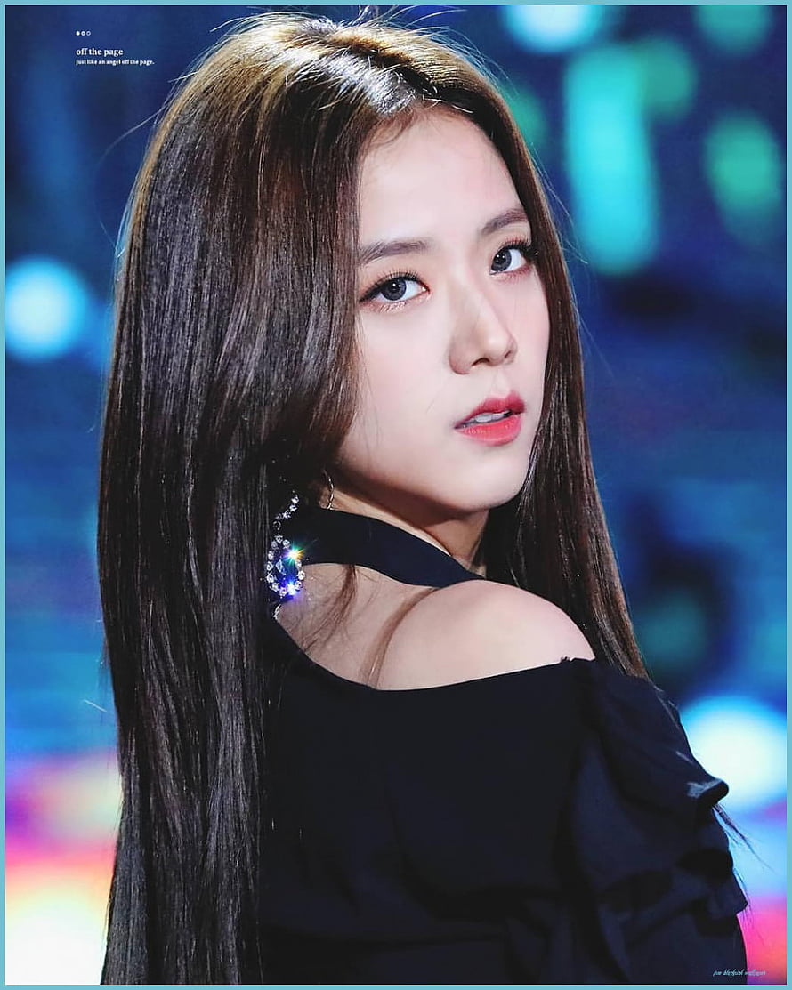 Jisoo from Blackpink in a black off-shoulder dress with long hair and sparkling earrings on stage HD phone wallpaper