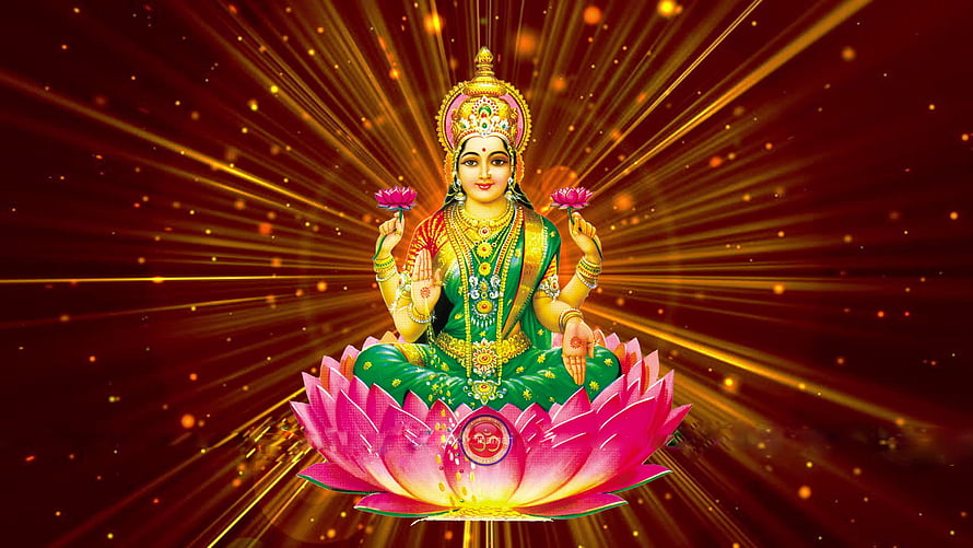 Goddess Lakshmi Sitting on a Pink Lotus with Golden Rays and Sparkles HD wallpaper