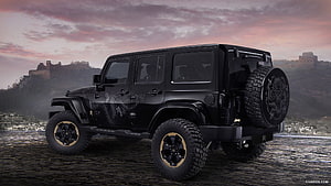 Black Jeep Wrangler with Dragon Graphics Parked Before the Great Wall of China at Sunset HD wallpaper