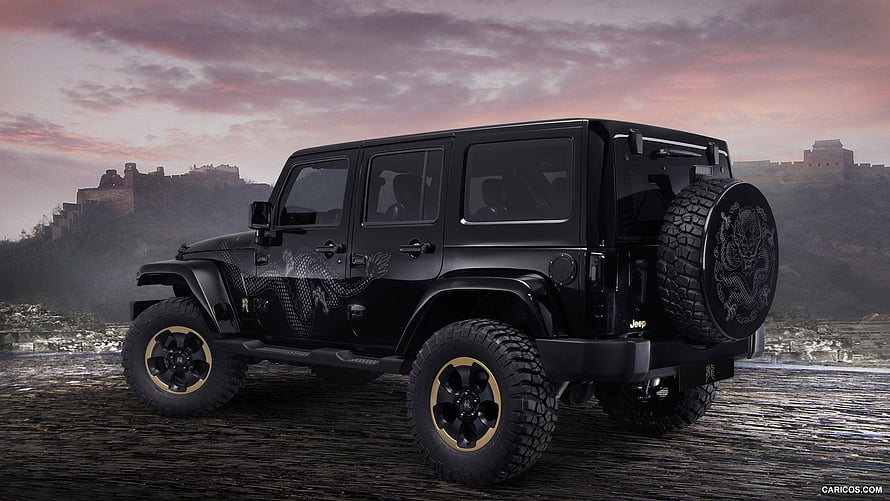 Black Jeep Wrangler with Dragon Graphics Parked Before the Great Wall of China at Sunset HD wallpaper