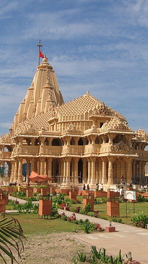 Somnath Temple in Gujarat India with intricate sandstone carvings and gardens HD phone wallpaper
