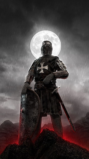 Medieval Knight in Full Plate Armor Standing on Rocky Outcrop Under Full Moon HD phone wallpaper