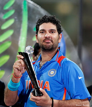 Yuvraj Singh Holding Cricket Trophy in India Blue Jersey HD phone wallpaper