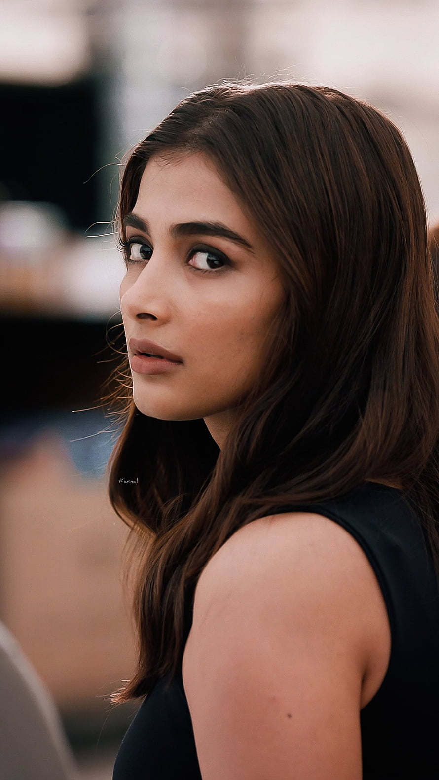 Pooja Hegde Close-Up Portrait With Long Brown Hair And Intense Gaze HD phone wallpaper
