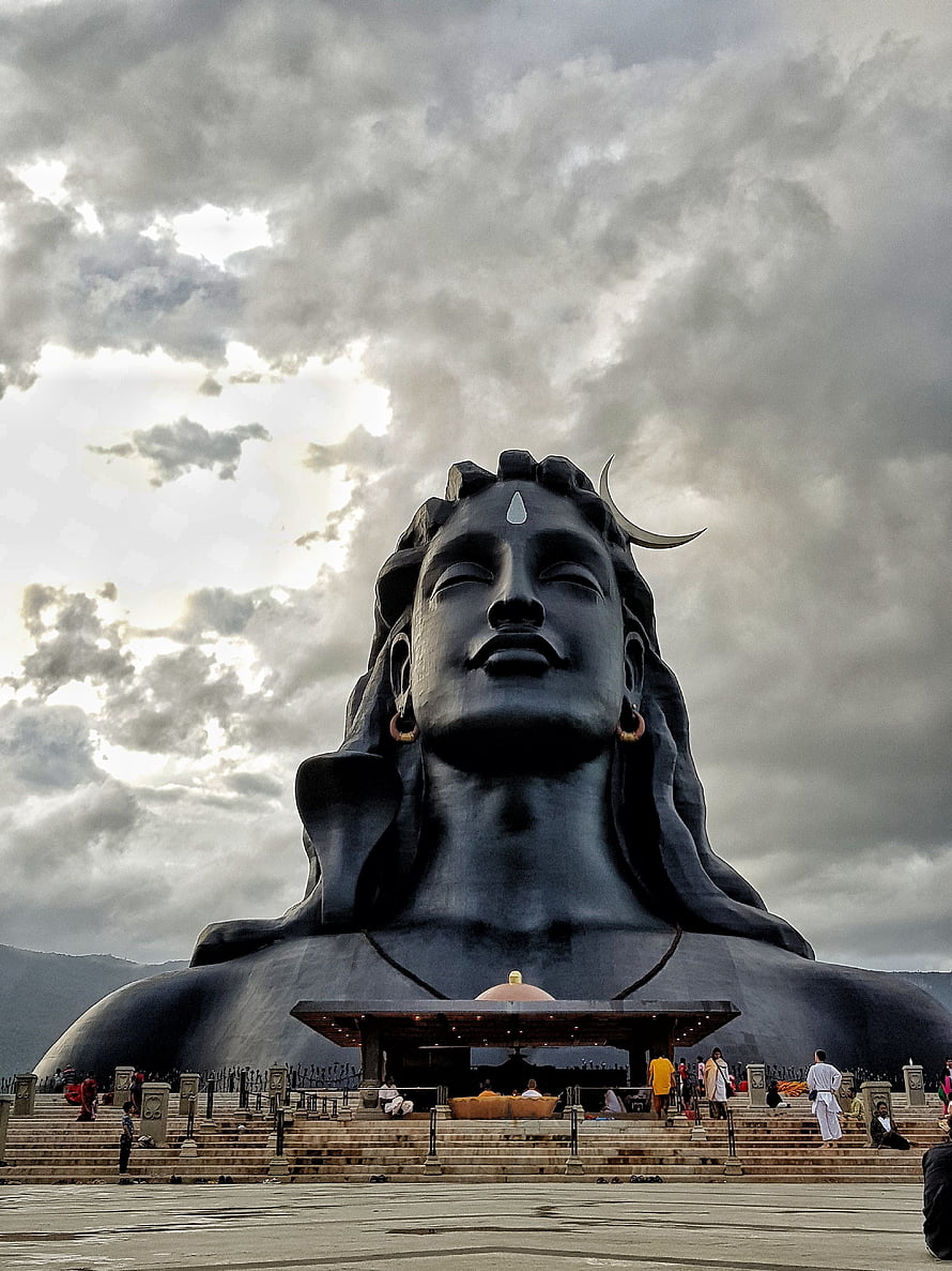 Adiyogi Shiva Statue at Isha Yoga Center with Dramatic Cloudy Sky HD phone wallpaper