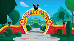 Mickey Park Entrance Archway with Colorful Path and Green Hills HD wallpaper