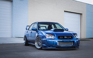 Blue Subaru Impreza WRX STI with Custom Widebody and Mesh Grille HD wallpaper