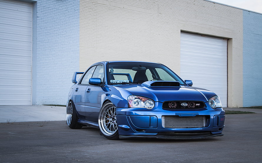 Blue Subaru Impreza WRX STI with Custom Widebody and Mesh Grille HD wallpaper