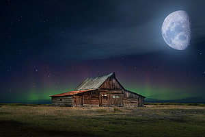 Rustic Log Cabin Under Starry Night Sky With Full Moon And Aurora Borealis HD wallpaper