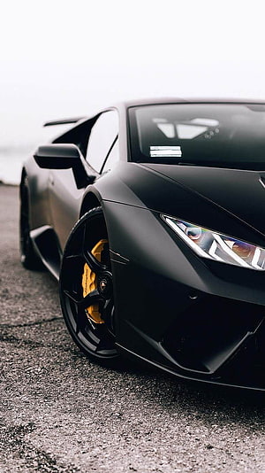 Matte Black Lamborghini Huracan with Yellow Brake Calipers HD phone wallpaper