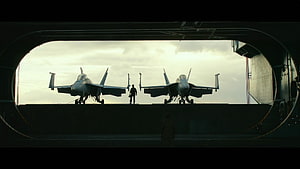 Top Gun Maverick Fighter Jets on Aircraft Carrier Deck at Sunset HD wallpaper