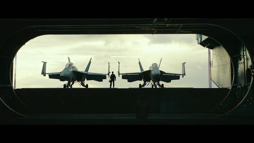 Top Gun Maverick Fighter Jets on Aircraft Carrier Deck at Sunset HD wallpaper