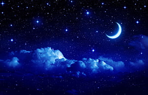Serene Night Sky With Glowing Crescent Moon And Fluffy Clouds HD wallpaper