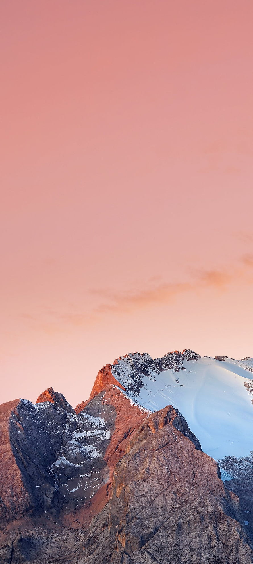 Alpine Mountain Peak with Snow and Glacial Ice Under a Soft Pink Sunset Sky HD phone wallpaper
