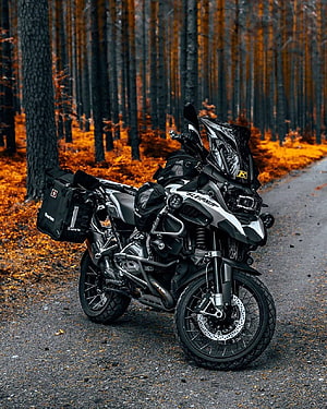 BMW R1250GS Adventure Motorcycle Parked on a Forest Road with Autumn Foliage HD phone wallpaper