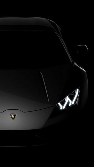 Lamborghini Urus Front View With Glowing LED Headlights In Dark Atmosphere HD phone wallpaper