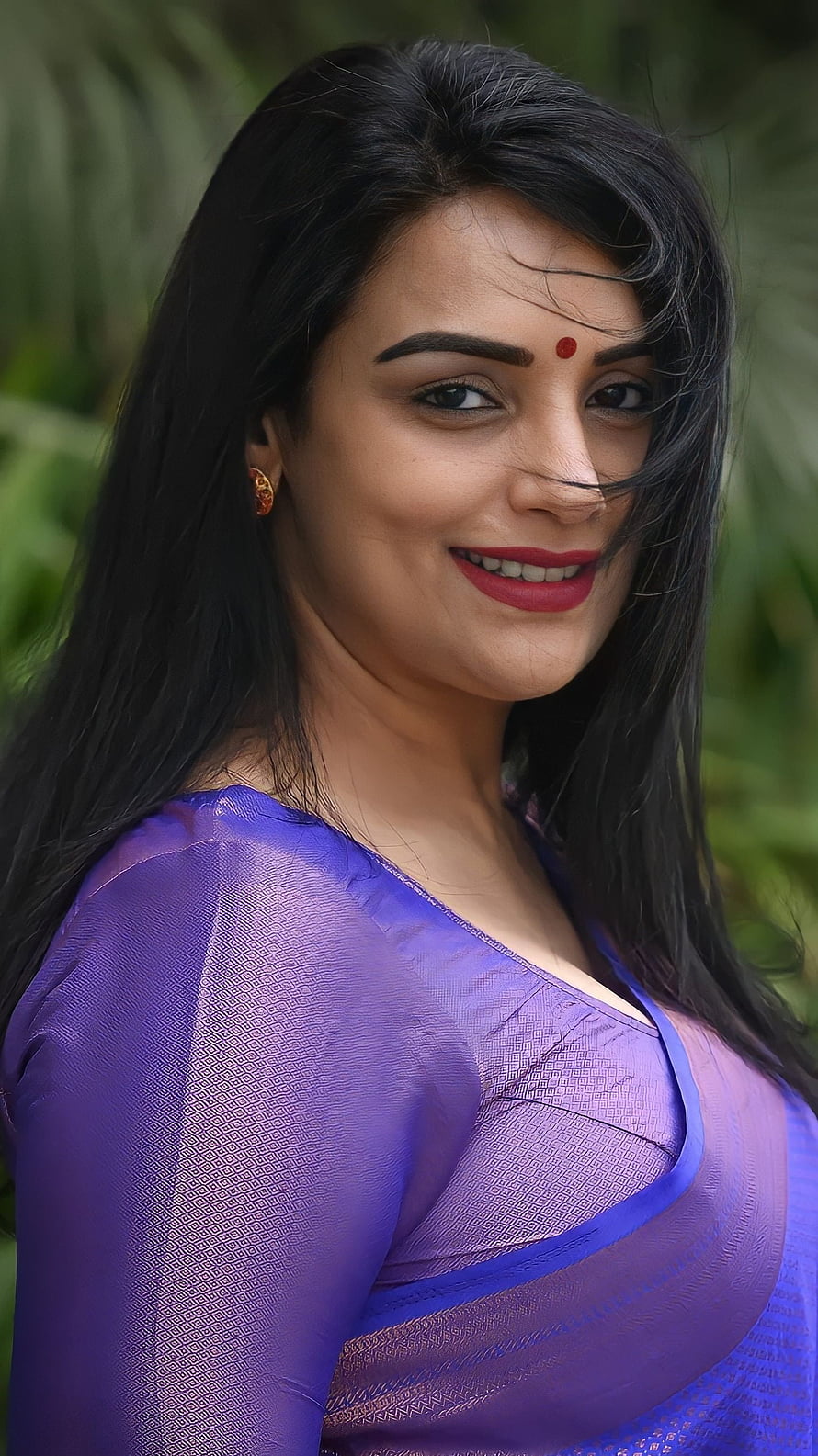 Portrait of Indian Actress Keerthy Suresh Wearing a Purple Saree with a Red Bind HD phone wallpaper