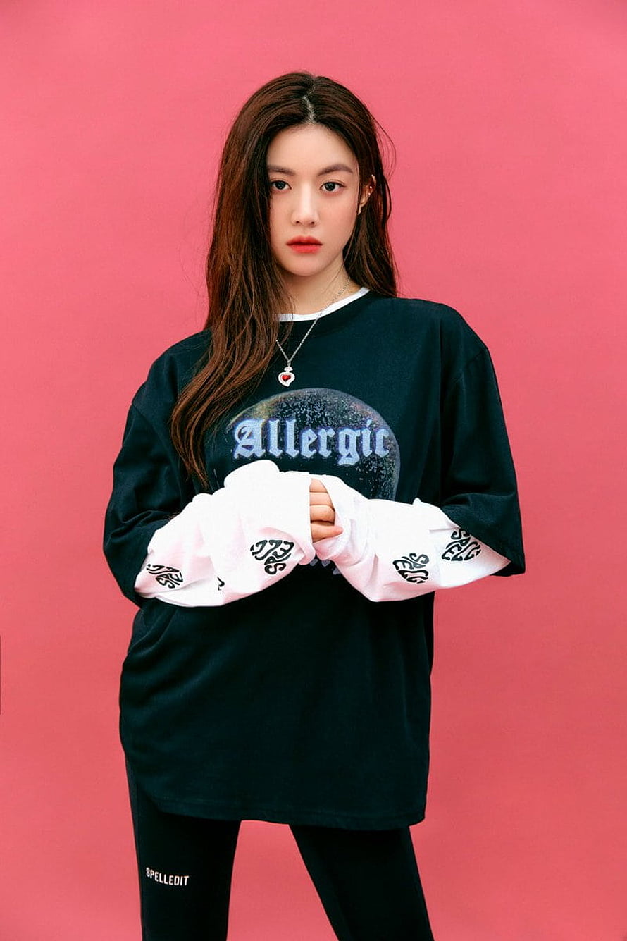 Go Yoon Jung in oversized black Allergic graphic tee and pink sleeves against a pink studio backdrop HD phone wallpaper