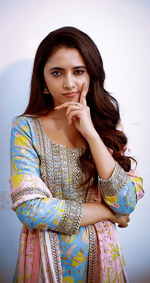 Priyanka Mohan in a floral blue and pink traditional dress with gold embroidery HD phone wallpaper