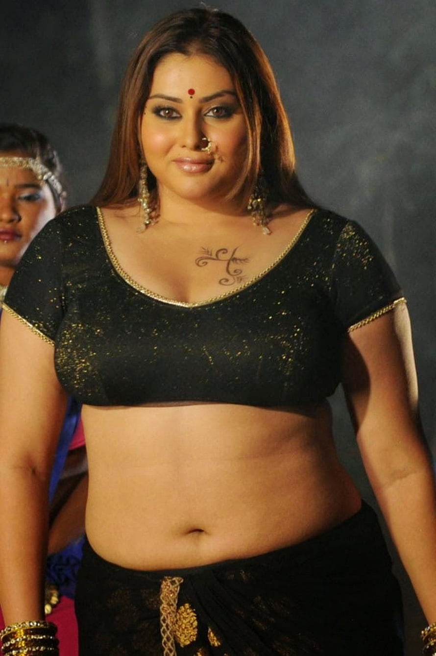 Namitha in Black and Gold Traditional Attire with Nose Ring and Chest Tattoo HD phone wallpaper