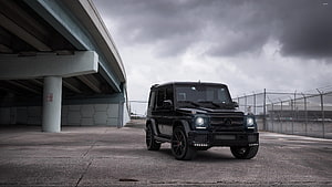 Black Brabus G-Wagon SUV Parked Under Concrete Overpass HD wallpaper