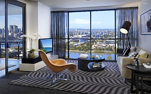 Modern High-Rise Living Room With Panoramic City View And Contemporary Furniture HD wallpaper