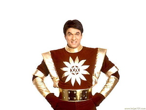 Shaktimaan Hero in Brown and Gold Costume with Star Emblem HD wallpaper