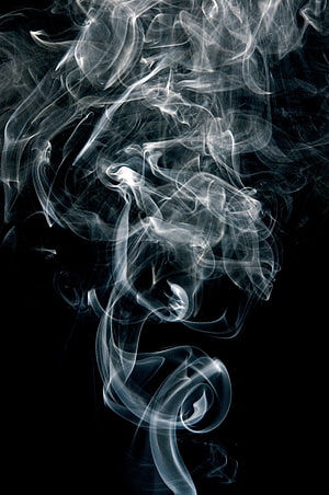 Ethereal White Smoke Swirling Against a Deep Black Background HD phone wallpaper