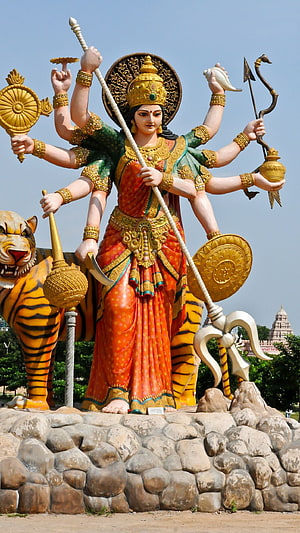 Giant Statue of Goddess Durga with Tiger and Trishul HD phone wallpaper