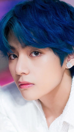 V from BTS with vibrant blue hair and diamond earring in a close-up portrait HD phone wallpaper