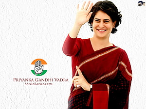 Priyanka Gandhi Vadra Waving in Red Saree with Congress Party Hand Symbol HD wallpaper