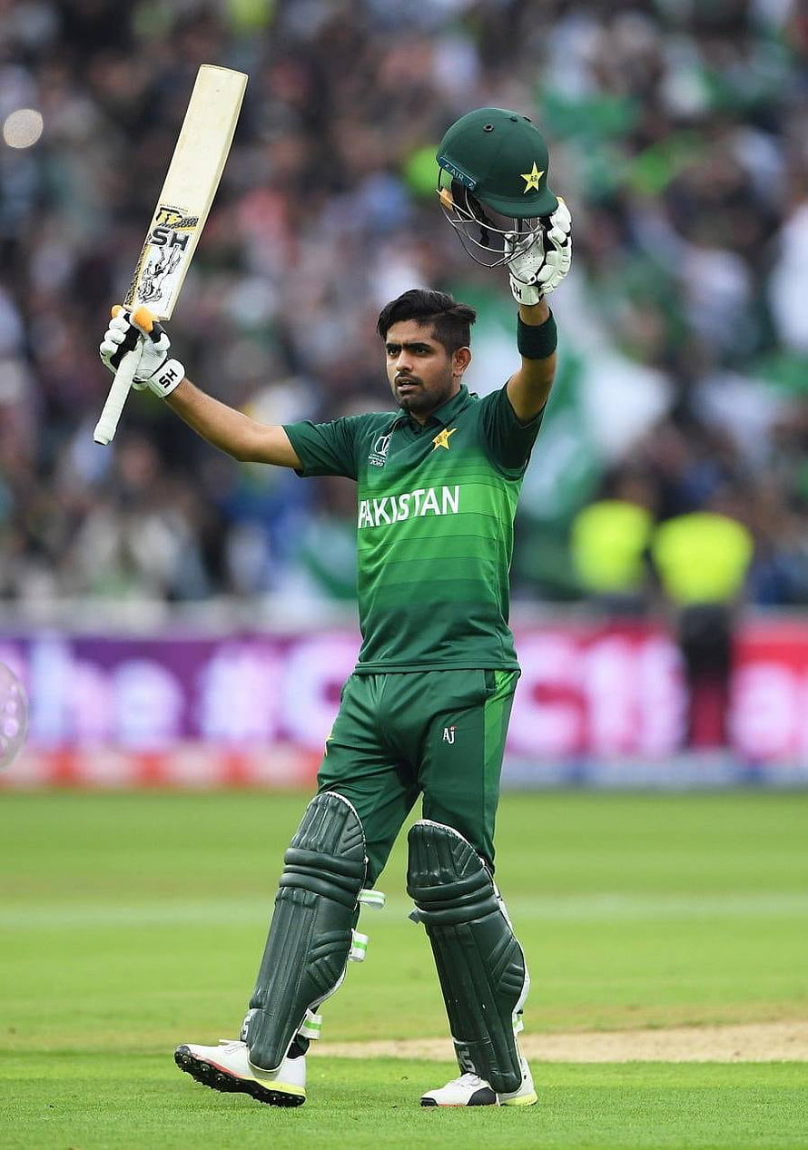Babar Azam Celebrating a Milestone in Pakistan Cricket Kit on the Field HD phone wallpaper