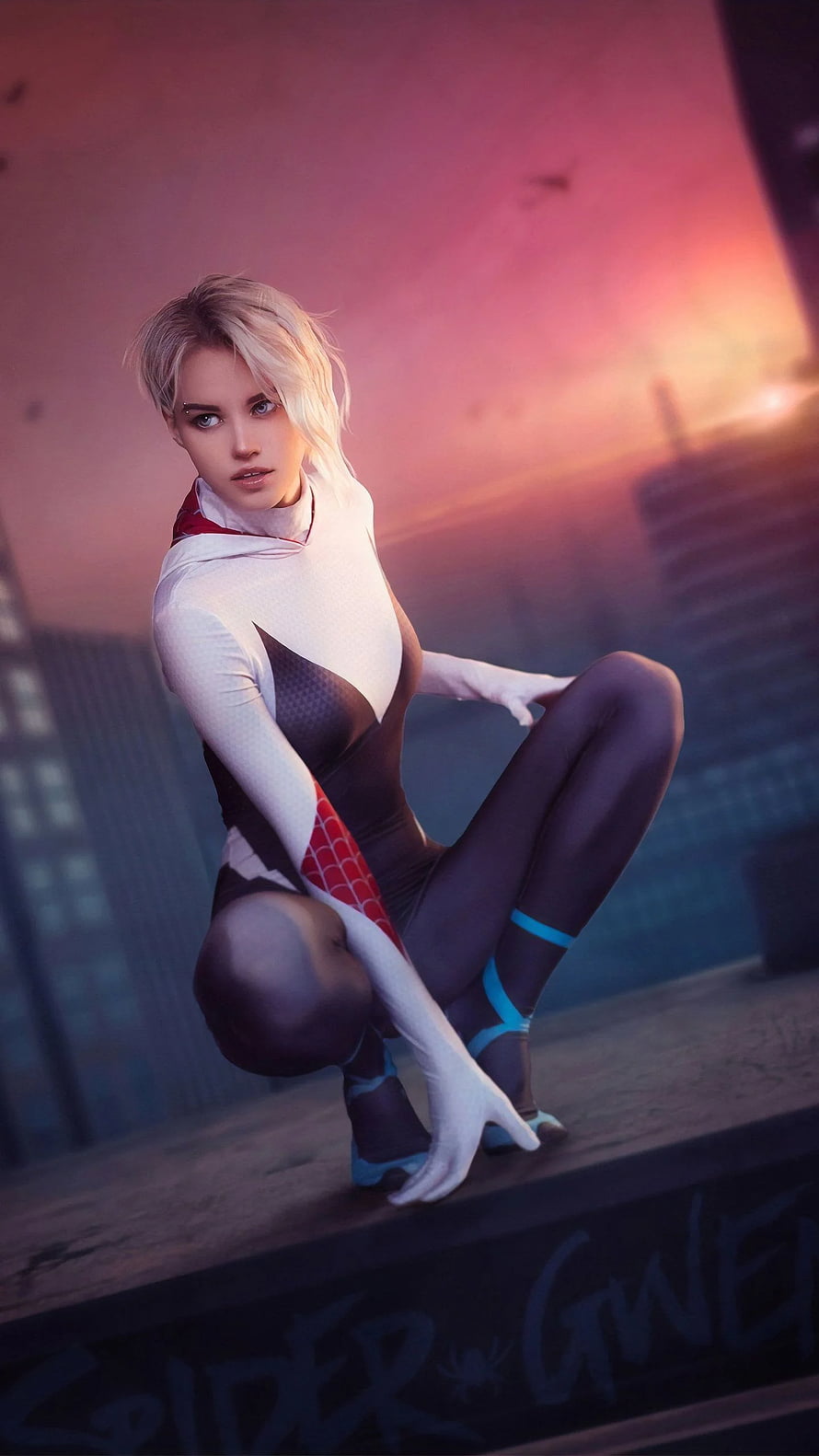 Spider-Gwen Crouching on Rooftop at Sunset in White and Black Suit HD phone wallpaper