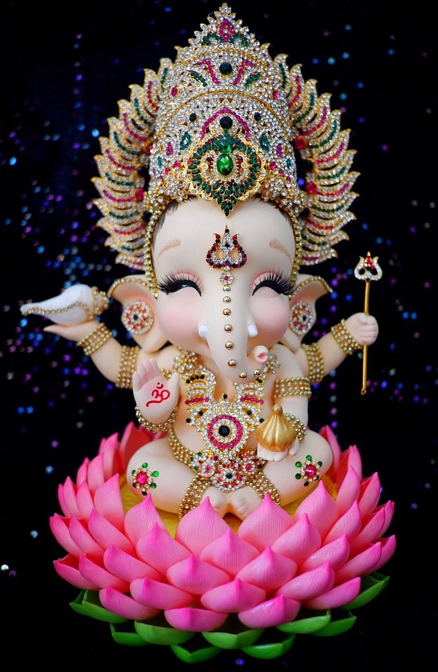Adorable Baby Ganesha Sitting on Pink Lotus with Jeweled Crown and Golden Accessories HD phone wallpaper