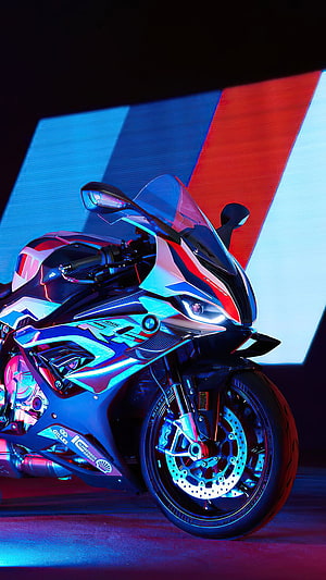 BMW M 1000 RR Superbike in Neon Blue and Red Lighting HD phone wallpaper