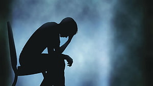 Silhouette of a Depressed Man Sitting on a Chair with Head in Hand, Sad Mood, Mood Off HD wallpaper