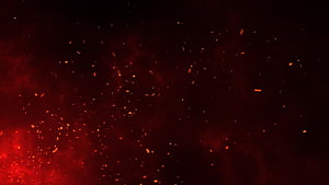 Glowing Red Embers and Sparks Floating in Dark Smoke Atmosphere HD wallpaper