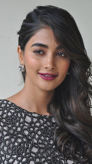 Pooja Hegde Portrait in Black Crochet Top with Long Wavy Hair and Crystal Earrings HD phone wallpaper