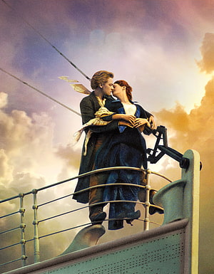 Leonardo DiCaprio and Kate Winslet Embrace on the Bow of the Titanic Ship HD phone wallpaper