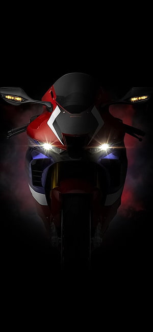 Front View of Red Honda CBR1000RR-R Fireblade Motorcycle with Headlights On HD phone wallpaper