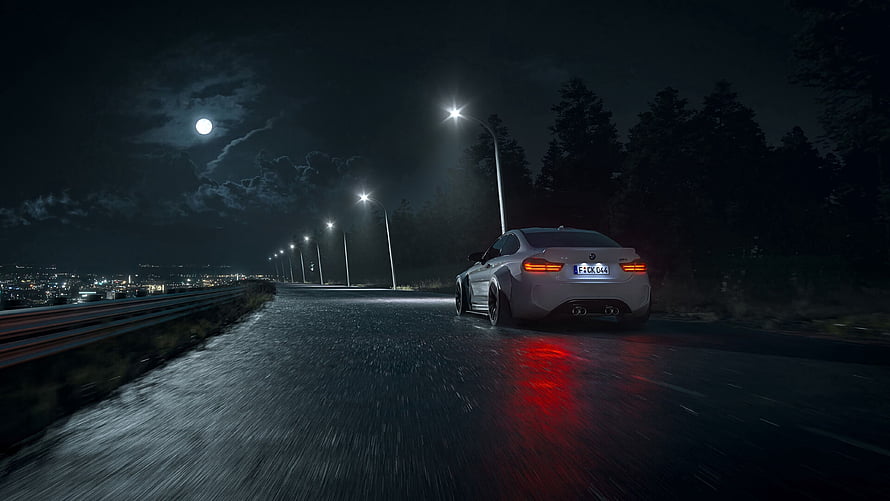 Silver BMW M4 driving on a wet road at night with city lights and moon HD wallpaper